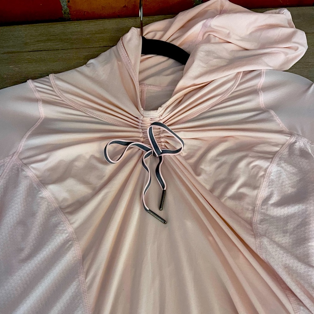 Lululemon pullover hoodie in light pink with grey trim size 10
